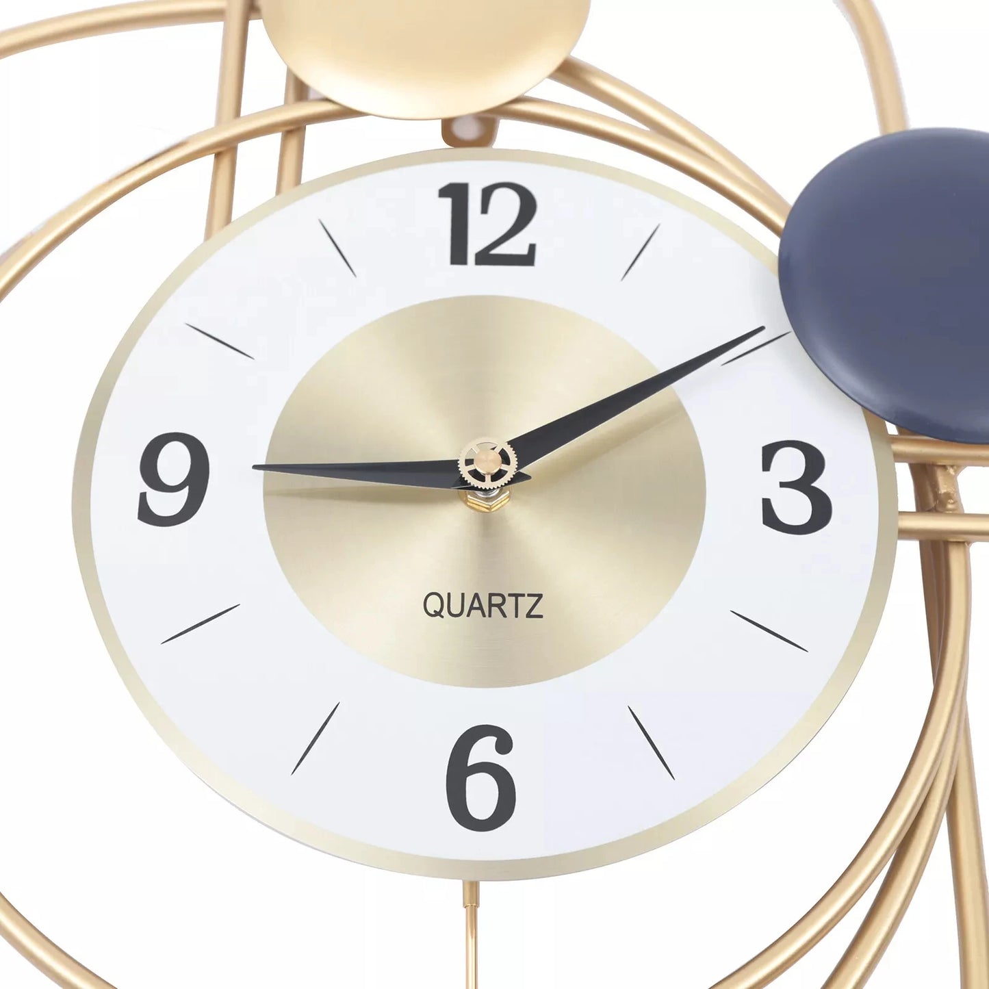 🕰️ “Art in Motion” – Modern Nordic Wall Clock in Matte Gold-Tone with Sculptural Detail